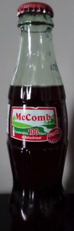 2006-5785- € 5,00 coca cola flesje 8oz Mc Comb celebrating 100 years.jpeg